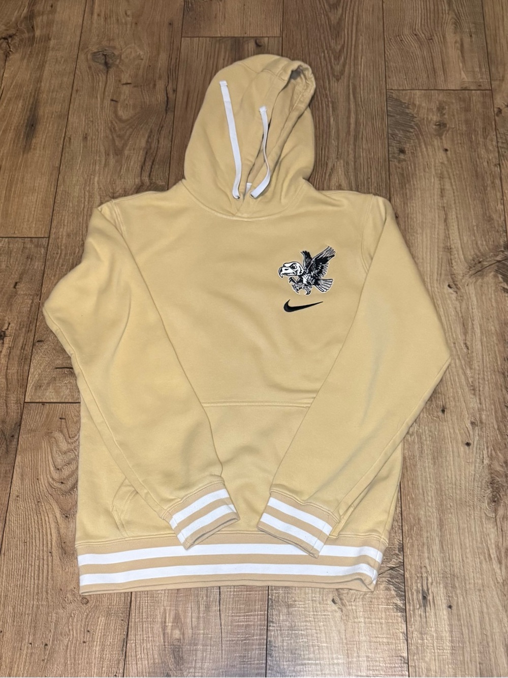 Nike Pale Yellow Iowa Hawkeyes Hoodie with retro style and swoosh